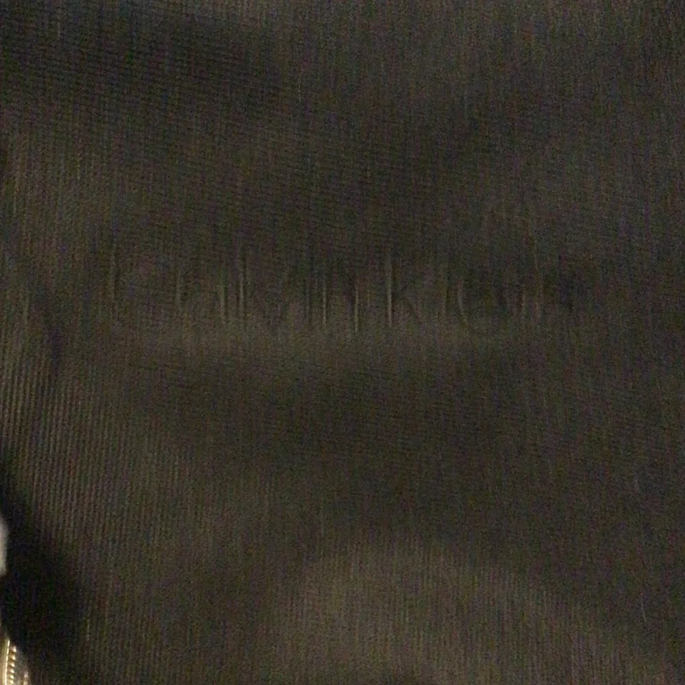 New Calvin Klein Elegant Black canvas and leather Duffel Bag